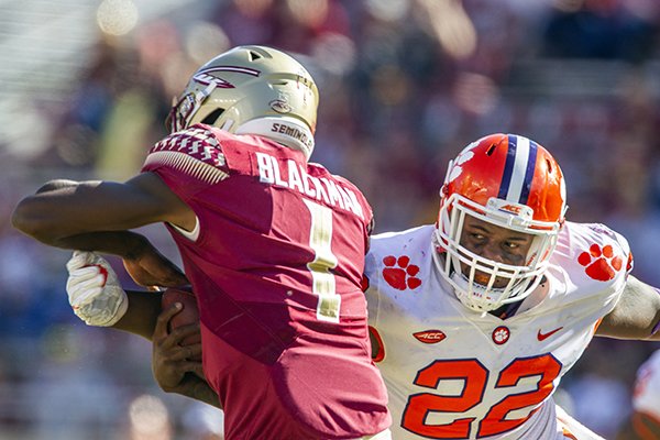 Clemson defensive lineman Xavier Kelly, right, sacks Florida State back up quarterback James Blackman in the second half of an NCAA college football game in Tallahassee, Fla., Saturday, Oct.27, 2018. (AP Photo/Mark Wallheiser)


