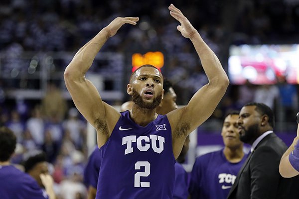 TCU guard Edric Dennis looks to fire the crowd during a time out in the second half of an NCAA college basketball game against Texas Tech in Fort Worth, Texas, Tuesday, Jan. 21, 2020. TCU won 65-54. (AP Photo/Ray Carlin)


