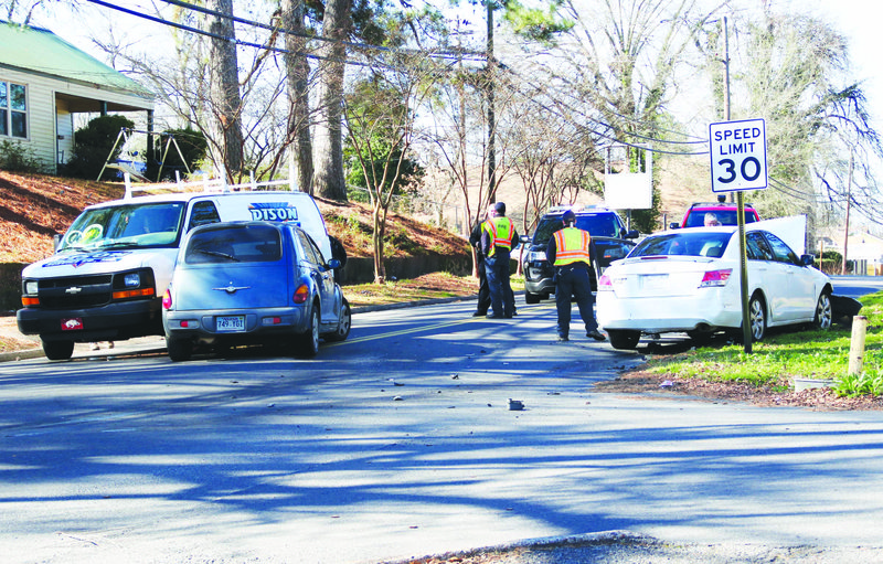 Man taken to the hospital, faulted for causing Main Street wreck on
