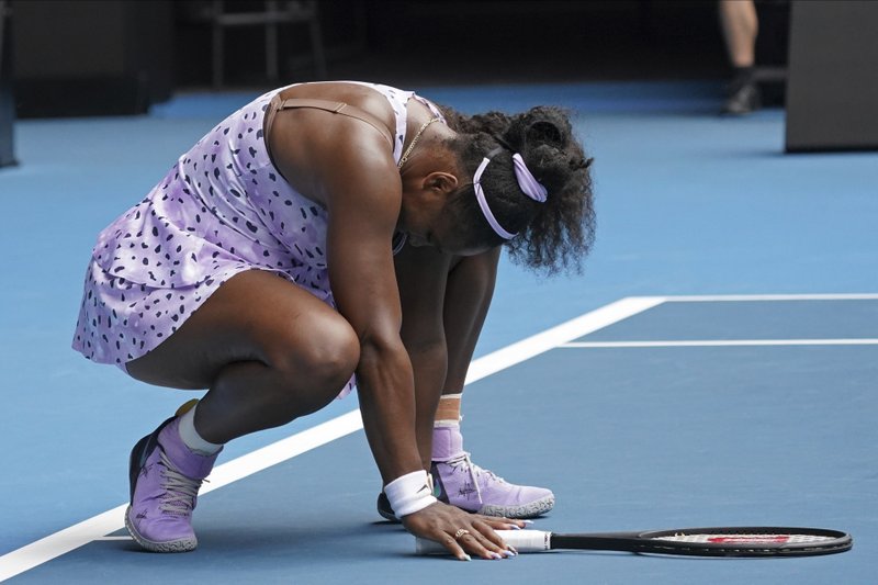 Serena Williams of the U.S. reacts as she plays China's Wang Qiang in their third round singles match at the Australian Open tennis championship in Melbourne, Australia, Friday, Jan. 24, 2020. (AP Photo/Lee Jin-man)