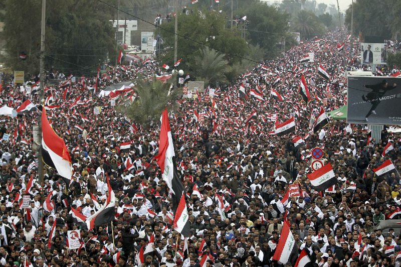 Followers of Shiite cleric Muqtada al-Sadr ll central Baghdad during a protest Friday.