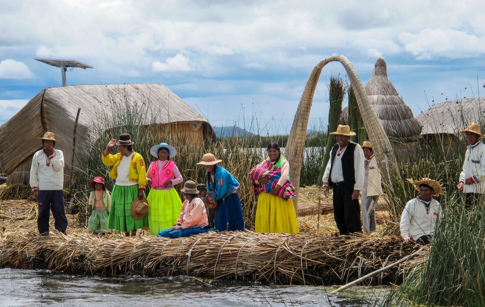 Grateful for visitors, Antonio Jullahui and the other residents of a floating island on Lake Titicaca gather to wave goodbye to their departing guests. The Uros economy is largely depended upon tourism.
(TNS/Thomas Curwen)