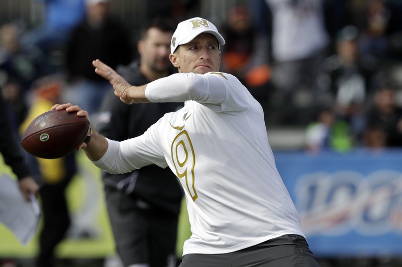 NFC quarterback Drew Brees, of the New Orleans Saints, throws a pass during a practice for the NFL Pro Bowl football game Wednesday, Jan. 22, 2020, in Kissimmee, Fla. (AP Photo/Chris O'Meara)