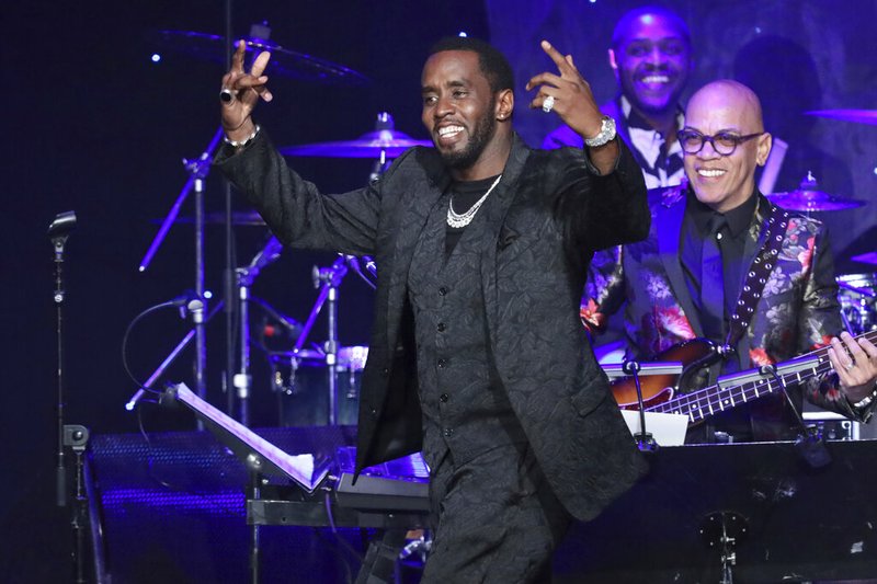 Sean Combs walks on stage to accept the 2020 Industry Icon award at the Pre-Grammy Gala And Salute To Industry Icons at the Beverly Hilton Hotel on Saturday, Jan. 25, 2020, in Beverly Hills, Calif.
