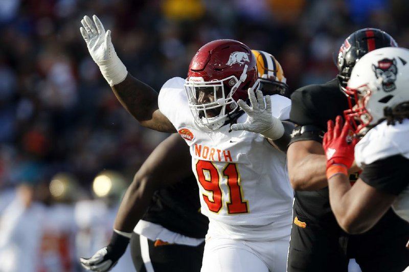 Former Arkansas defensive lineman McTelvin Agim rushes the passer during the second half of the Senior Bowl on Saturday in Mobile, Ala. Agim’s North team won 31-17 over the South.
(AP/Butch Dill)