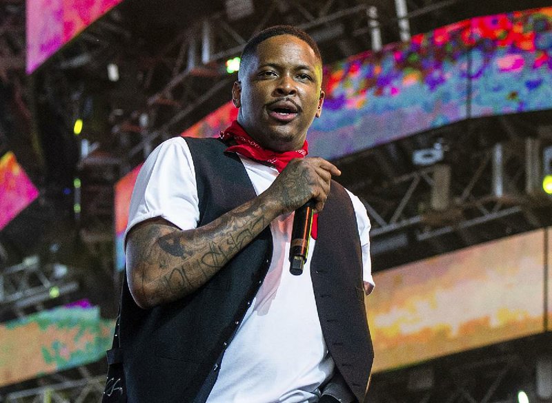 In this April 14, 2019, file photo, rapper YG performs at the Coachella Music & Arts Festival in Indio, Calif. YG, whose real name is Keenon Jackson ,was arrested Friday, Jan. 24, 2020, at his Los Angeles home on suspicion of robbery just two days before he is scheduled to perform at the Grammy Awards, officials said. (Photo by Amy Harris/Invision/AP, File)
