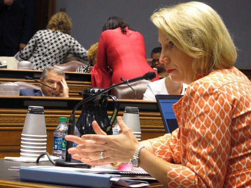 Louisiana Health Secretary Rebekah Gee, shown last year answering questions from lawmakers about the managed care contracts, is resigning from her post at the end of the month. A new health secretary will inherit the contract dispute.
(AP/Melinda Deslatte)