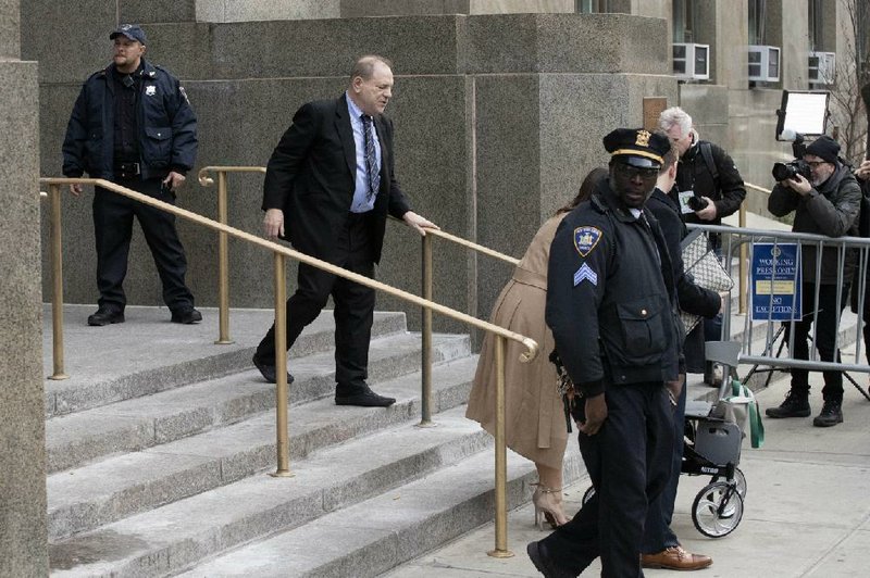 Harvey Weinstein leaves a courthouse Friday after proceedings at his trial in New York. More photos at arkansasonline.com/126weinstein/.
(AP/Mark Lennihan)