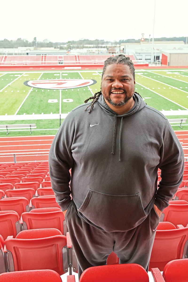 Maurice Moody, the Jacksonville Titans’ new football coach, shown here in the district’s new stadium, said he’s excited for the opportunity to coach for the Jacksonville North Pulaski School District. “The community and everyone welcomed me with open arms,” he said. Moody’s aim is to build up Jacksonville’s football program.