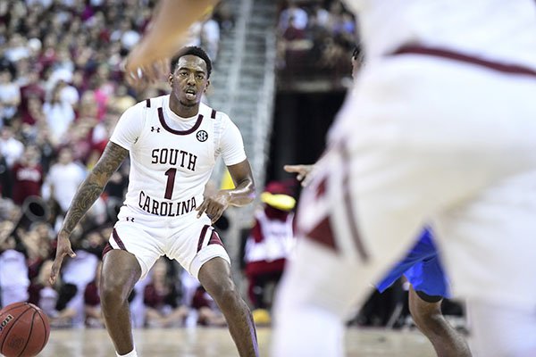 South Carolina guard T.J. Moss (1) dribbles the ball against Kentucky during the second half an NCAA college basketball game Wednesday, Jan. 15, 2020, in Columbia, S.C. South Carolina defeated Kentucky 81-78. (AP Photo/Sean Rayford)


