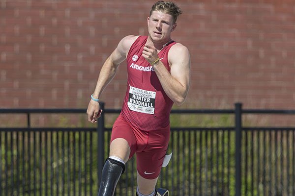 Arkansas' Hunter Woodhall runs during the third heat of the men's 400 meters Friday, April 27, 2018, during the National Relay Championships at John McDonnell Field in Fayetteville. 