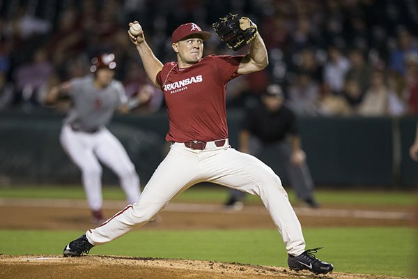 Arkansas pitcher Kevin Kopps throws during a scrimmage against Oklahoma on Friday, Sept. 20, 2019, in Fayetteville. 