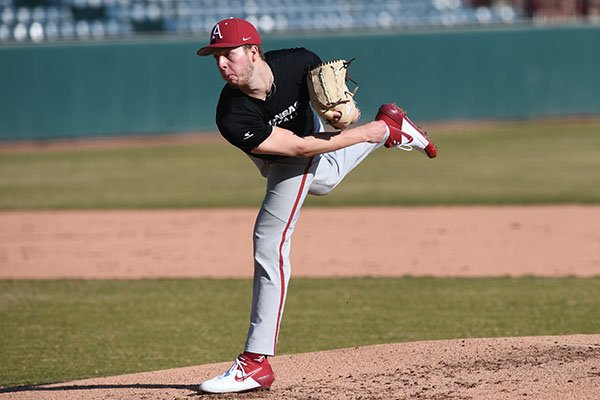 Arkansas pitcher Caleb Bolden throws during a scrimmage Monday, Jan. 27, 2020, at Baum-Walker Stadium in Fayetteville.