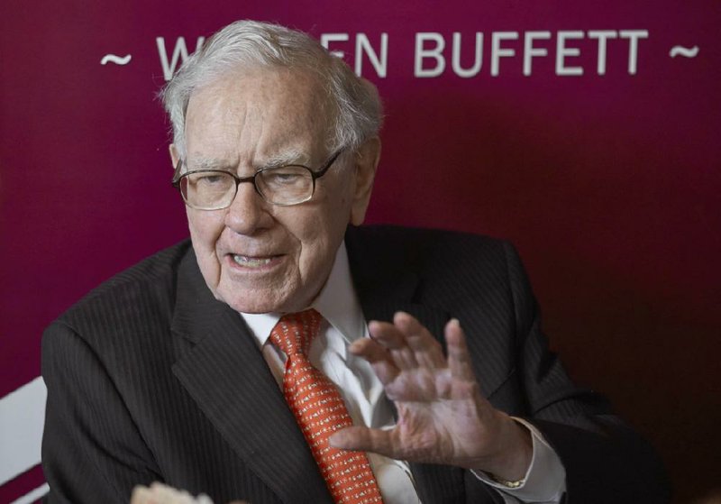 Billionaire Warren Buffett, who in 2012 described himself as a newspaper “addict,” is getting out of the newspaper business.
(AP/Nati Harnik)