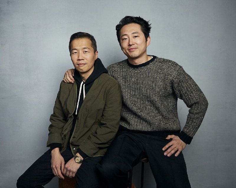 Director Lee Isaac Chung (left) and actor Steven Yeun pose for a portrait to promote Chung’s Arkansas-set film Minari at the Music Lodge during the Sundance Film Festival.  