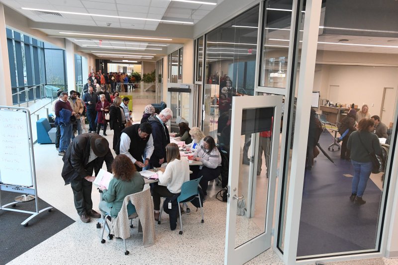 Faculty and staff members line up Monday Dec. 16, 2019 Arkansas Department of Health to get vaccinations at the Pat Walker Health Center at the University of Arkansas. Faculty and staff at the university will be required to have two measles, mumps and rubella vaccinations or otherwise show proof of immunity by Jan. 10 as the number of confirmed mumps cases tied to campus has risen to 32.
(NWA Democrat-Gazette/J.T.WAMPLER )