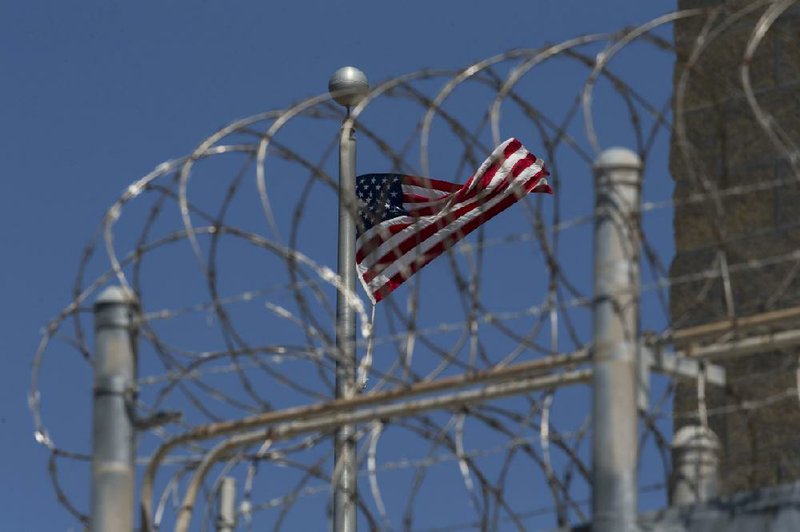 A military court at the Guantanamo Bay detention center in Cuba is hearing testimony about an interrogation program long shrouded in secrecy. The proceedings are being transmitted to several government installations in the U.S.
(AP/Alex Brandon)