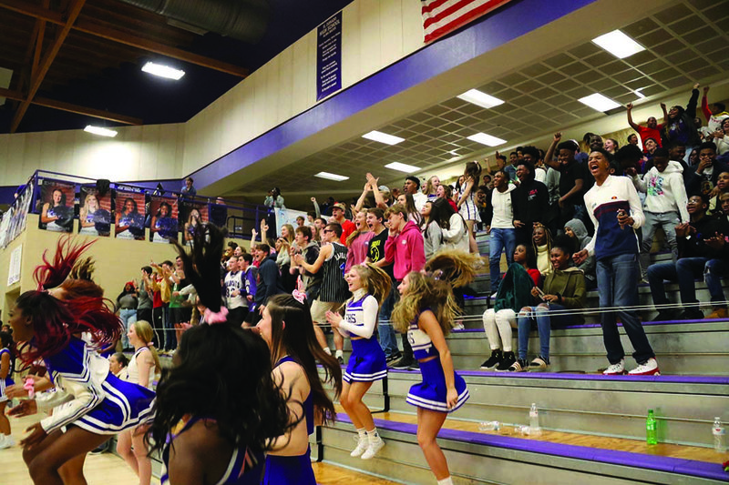 El Dorado's cheerleaders and Sixth Man crowd reacts after Jordan Tubbs hit the game-tying shot Friday against Sheridan. The Wildcats lost 56-53 Friday at Wildcat Arena.