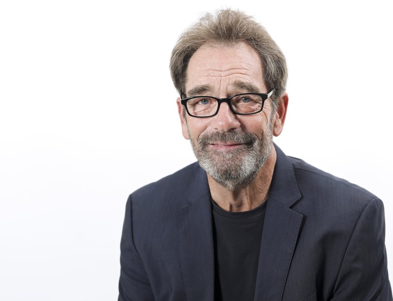 FILE - This Oct. 2, 2019 file photo shows musician Huey Lewis posing for a portrait in New York. The 69-year-old frontman for Huey Lewis &amp; The News has a new album &quot;Weather&quot; out on Feb. 14. (Photo by Brian Ach/Invision/AP, File)