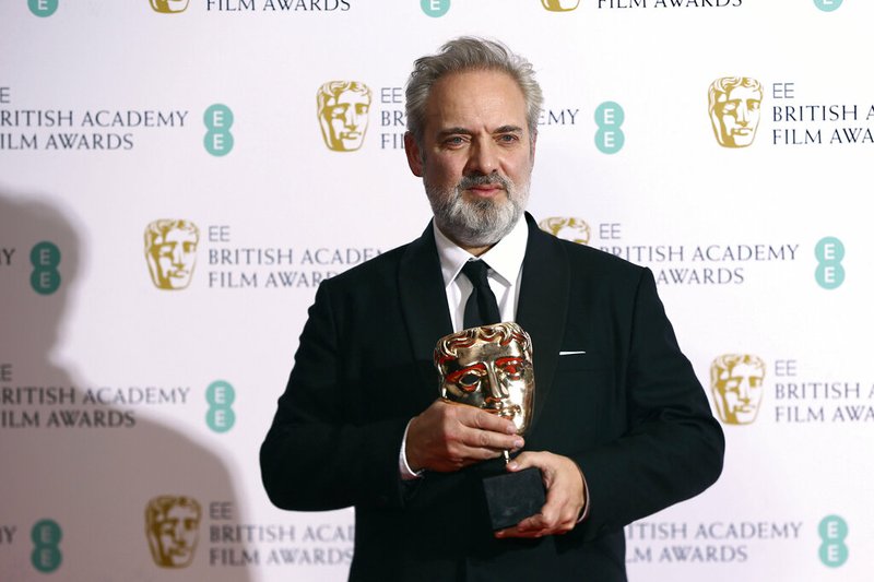 Director Sam Mendes poses with the Best Director award for "1917" backstage at the British Academy Film Awards on Sunday in central London.