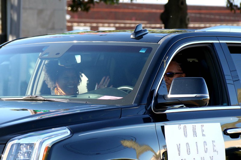 El Dorado Mayor Veronica Smith-Creer waves at people during the Martin Luther King, Jr. Parade Jan. 19, 2020 down West Avenue. (News-Times file)