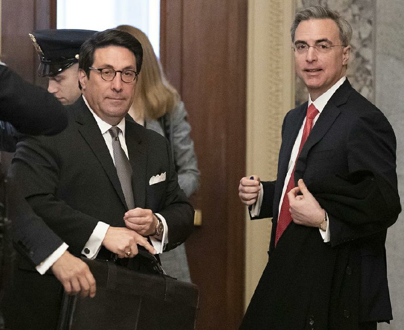 Jay Sekulow (left), President Donald Trump’s personal attorney, and White House counsel Pat Cipollone arrive Monday on Capitol Hill for closing arguments in Trump’s impeachment trial. More photos at arkansasonline.com/24impeachment/.  