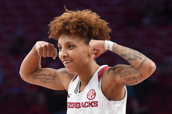 Arkansas guard Alexis Tolefree flexes after a score against Missouri on Sunday, Jan. 12, 2020 at Bud Walton Arena in Fayetteville.