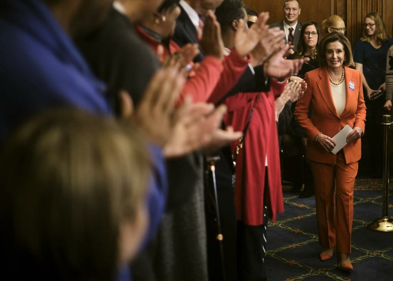 House Speaker Nancy Pelosi arrives to applause Wednesday on Capitol Hill to speak at an event pushing the Right to Organize Act. “Of course, I tried to be courteous and appropriate and all that,” she told colleagues about her actions at the State of the Union address. “But the fact is, there is too much at risk, too much at stake — and everything that America is: our Constitution, our rights, freedom of the press, the guardians of our democracy.”
(The New York Times/T.J. Kirkpatrick)