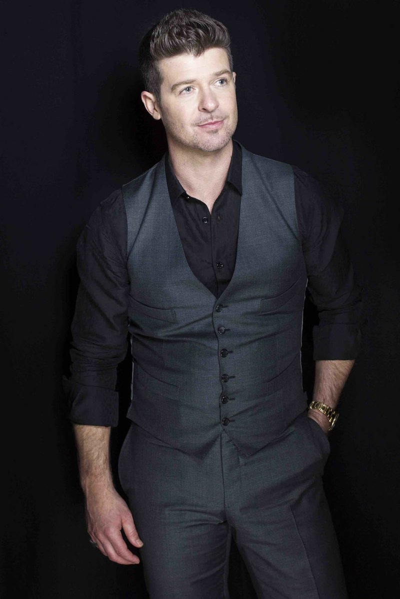 Robin Thicke, Masked Singer judge and vocal artist, will headline the American Diabetes Associstion benefit Kiss a Pig: Hog Holiday on March 14 at the John Q. Hammons Center in Rogers. (Photo by Victoria Will/Invision/AP, File) story.lead_photo.caption