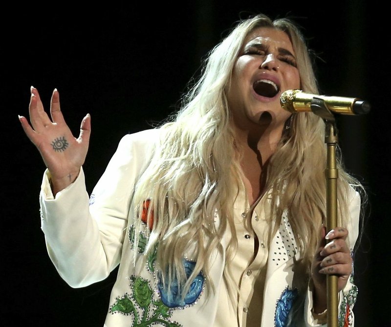 Kesha performs "Praying" at the 60th annual Grammy Awards at Madison Square Garden in New York in this 2018 file photo. The scrappy singer is out with a new album, High Road.
(Invision/AP/Matt Sayles)

