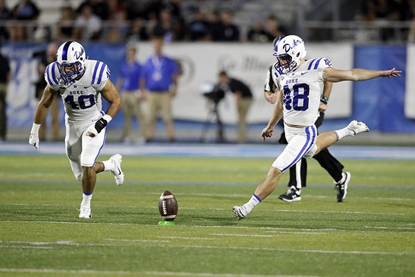Duke place kicker AJ Reed (48) kicks off to Middle Tennessee in the first half of an NCAA college football game Saturday, Sept. 14, 2019, in Murfreesboro, Tenn. At left is Jacob Morgenstern (40). (AP Photo/Mark Humphrey)


