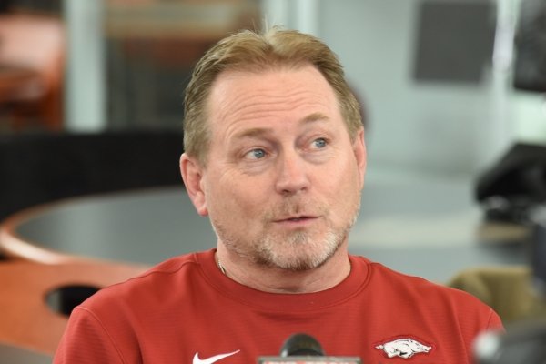Scott Fountain, an assistant coach with the University of Arkansas football team, speaks with members of the media Thursday, Feb. 6, 2020, inside the Fred W. Smith Football Center on the campus in Fayetteville.