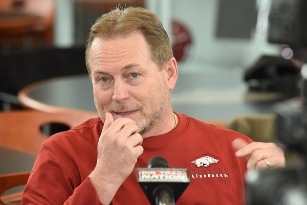 Scott Fountain, an assistant coach with the University of Arkansas football team, speaks with members of the media Thursday, Feb. 6, 2020, inside the Fred W. Smith Football Center on the campus in Fayetteville.