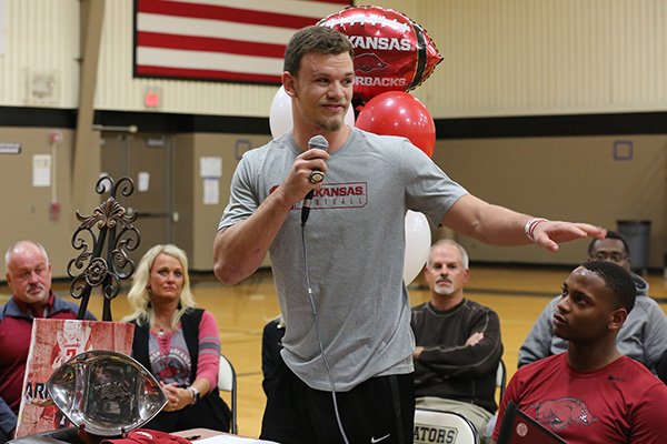 Joe T. Robinson linebacker JT Towers addresses the crowd before signing his national letter of intent to play for Arkansas on Wednesday, Feb. 5, 2020, at Robinson High School in Little Rock.