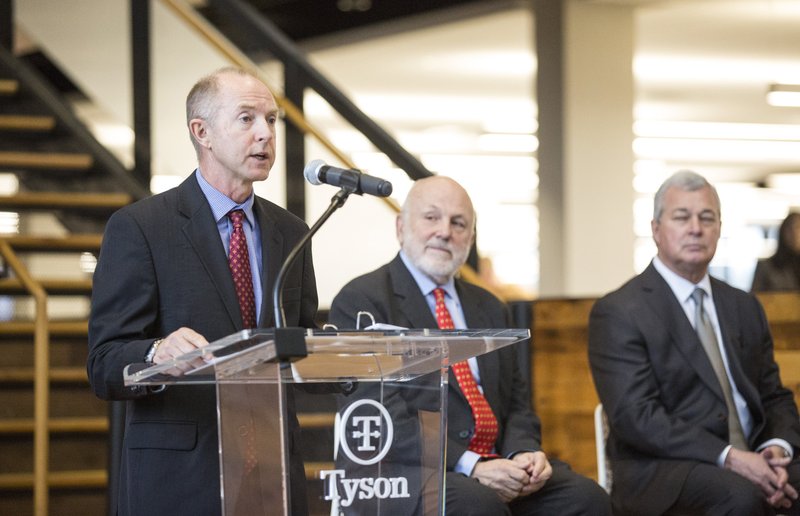 Stewart Glendinning (from left), chief financial officer, speaks Thursday, Feb. 6, 2020, as chairman of the board John Tyson and chief executive officer Noel White listen during the Tyson Foods annual shareholders meeting at the company's downtown Springdale office. Go to nwaonline.com/200207Daily/ to see more photos.