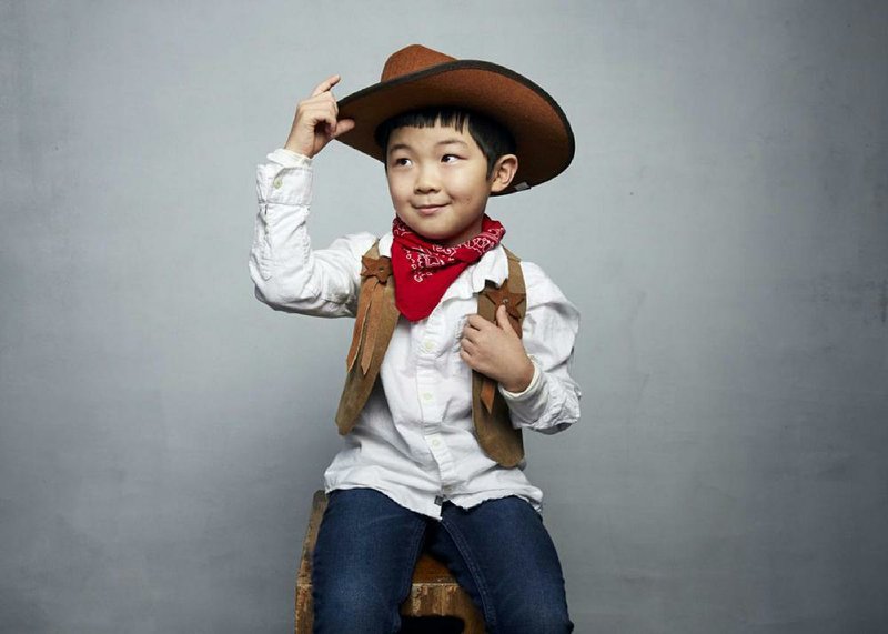 Alan S. Kim, the adorable and diminutive break-out star of the Arkansas-set film Minari, poses during a photoshoot at the recent Sundance Film Festival. 