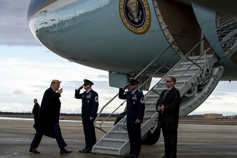 President Donald Trump boards Air Force One at Joint Base Andrews in Maryland on Friday as he heads to Charlotte, N.C. More photos at arkansasonline.com/28vindman/  