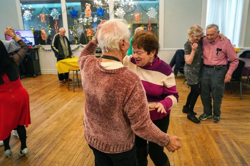 People socialize and dance at the East Midwood Jewish Center in Brooklyn in New York on Jan. 27.