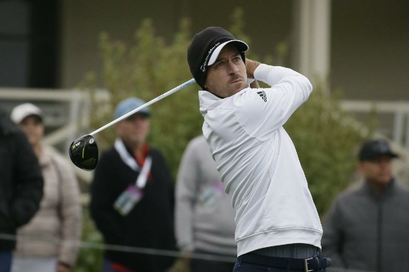 Nick Taylor leads Phil Mickelson by one stroke after three rounds at the AT&T Pebble Beach Pro Am in Pebble Beach, Calif.
(AP/Eric Risberg)