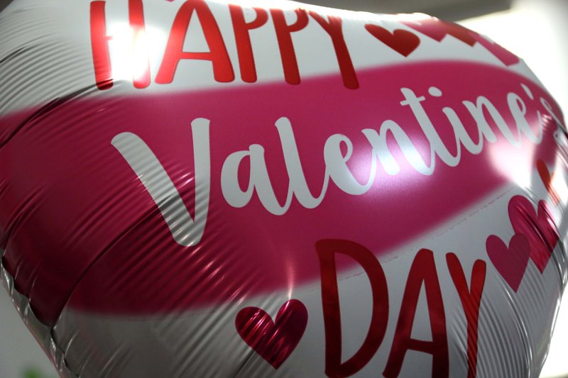 A Valentine's Day balloon at Shelly's Shoes during First Thursday Feb. 6. Here are a few ways to spend Valentine's Day or the weekend, whether you're single or have a partner.