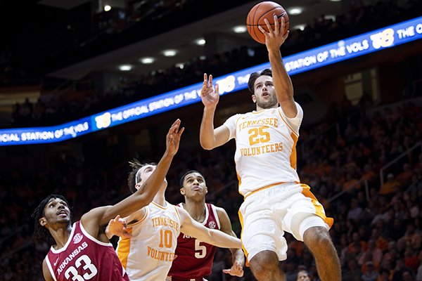 Tennessee guard Santiago Vescovi (25) attempts a shot during an NCAA college basketball game against Arkansas, Tuesday, Feb. 11, 2020 in Knoxville, Tenn. (Brianna Paciorka/Knoxville News Sentinel via AP)


