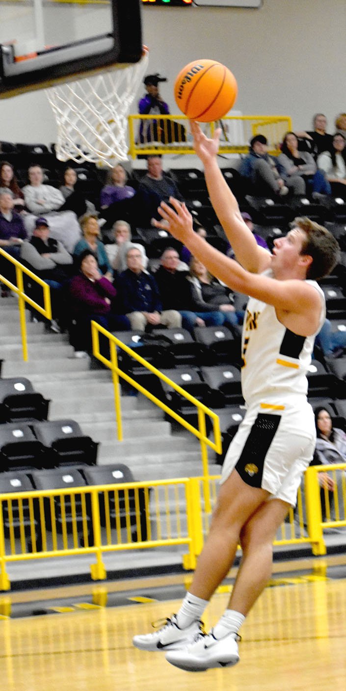 MARK HUMPHREY ENTERPRISE-LEADER Prairie Grove senior Cole Vertz scores a breakaway lay-up after making a steal. Vertz' defensive play turned into offense helped the Tigers defeat Berryville, 46-43, at home on Tuesday, Jan. 28.