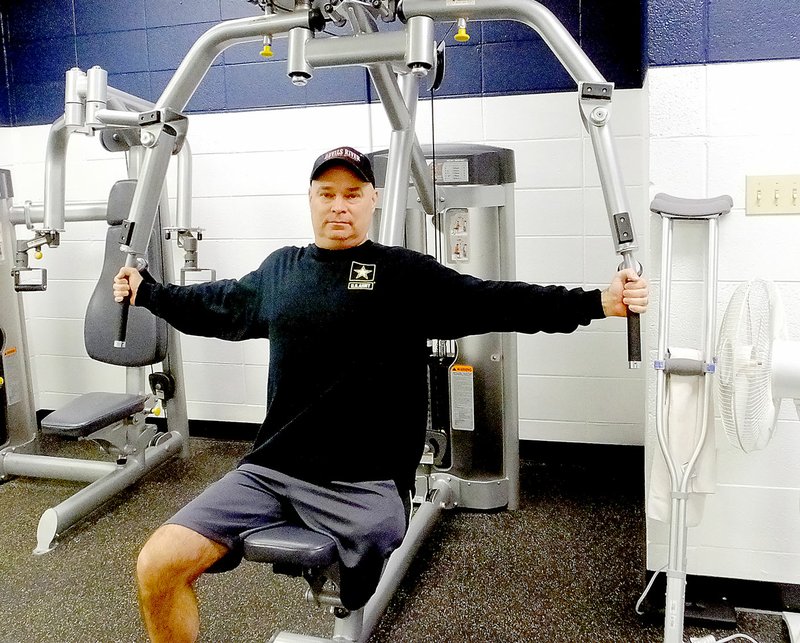 Lynn Atkins/The Weekly Vista Jason Long works out at Riordan Hall every day to prepare for the Veterans Wheelchair Olympics.