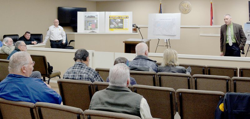 Keith Bryant/The Weekly Vista Bella Vista fire chief Steve Sims (left, background) fields questions alongside police chief James Graves during a town hall session last Wednesday, Feb. 5, focused on a municipal bond issue that will be going to voters during the March 3 primary election.