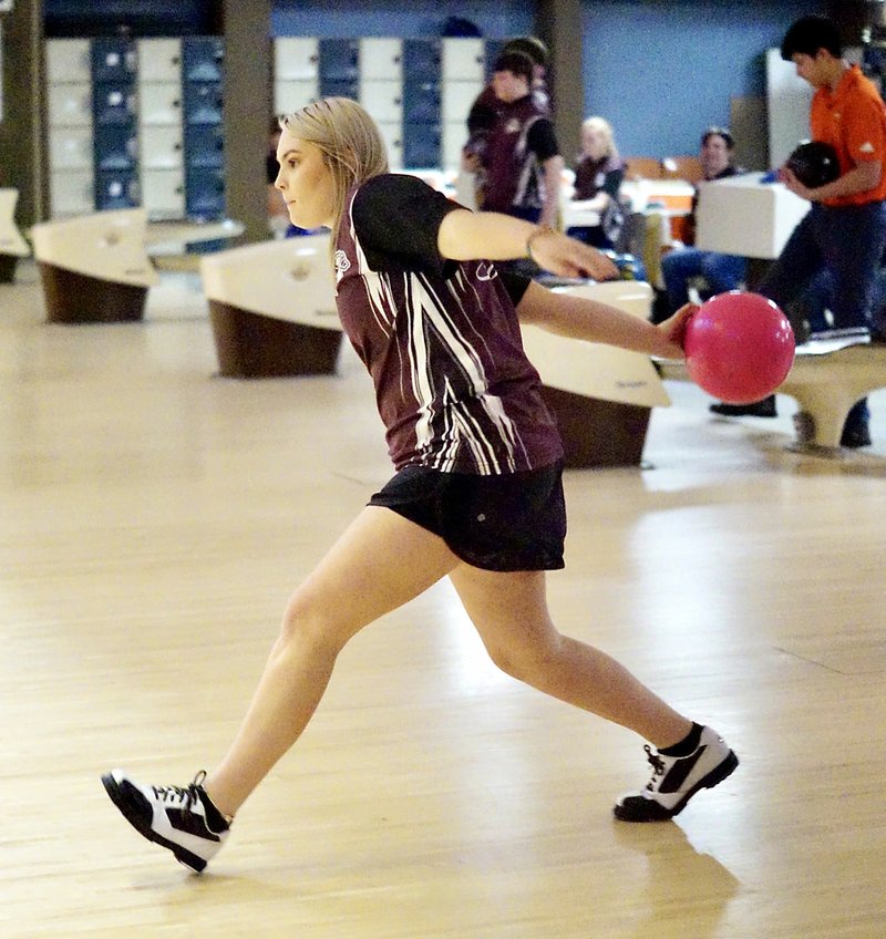 Westside Eagle Observer/RANDY MOLL
Gentry senior Madison Stanfill bowls Thursday against Rogers-Heritage at Hillside Lanes in Gentry.