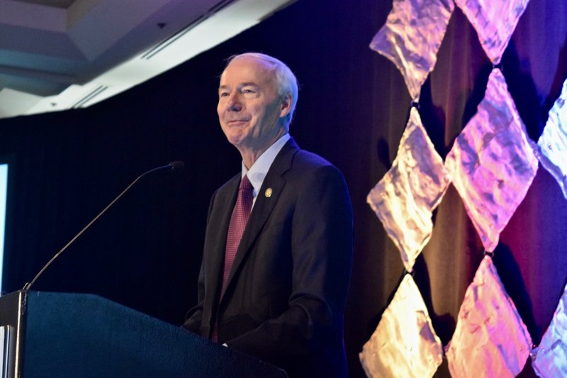 Arkansas Gov. Asa Hutchinson addresses the Southeast Tourism Society's conference in Little Rock on February 11.