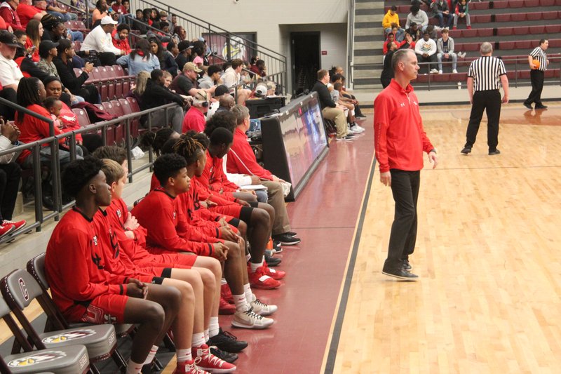 MHS Head Basketball Coach Ben Lindsey watches a game from the sidelines in a Banner-News file photo. 