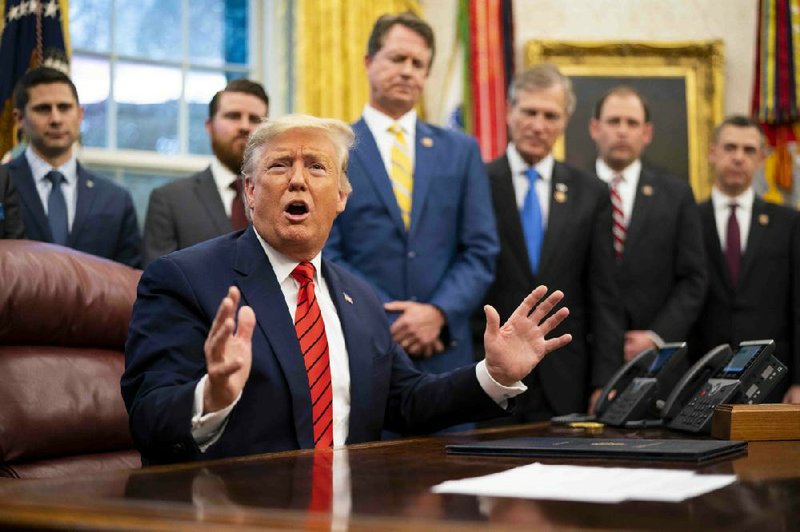 President Donald Trump speaks to reporters Tuesday during a White House event. Early in the day, Trump tweeted about the sentencing of confidant Roger Stone, calling it “a horrible and very unfair situation.”
(The New York Times/Doug Mills)