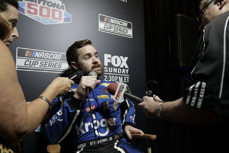 NASCAR Cup Series driver Ricky Stenhouse Jr. of Olive Branch, Miss., answers questions during the Daytona 500 media day Wednesday. Stenhouse, who began his career driving sprint cars at tracks in West Memphis and Little Rock, turned the fastest lap in Daytona 500 time trials on Sunday and will start on the pole in the first of two qualifying races today.
(AP/John Raoux) story.lead_photo.caption