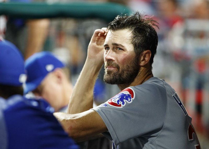 Former Chicago Cubs starting pitcher Cole Hamels reacts as he is pulled during the third inning of a baseball game against the Philadelphia Phillies, Wednesday, Aug. 14, 2019, in Philadelphia.
 (AP Photo/Chris Szagola)